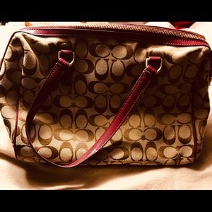 Genuine Coach satchel handbag w/detachable strap.